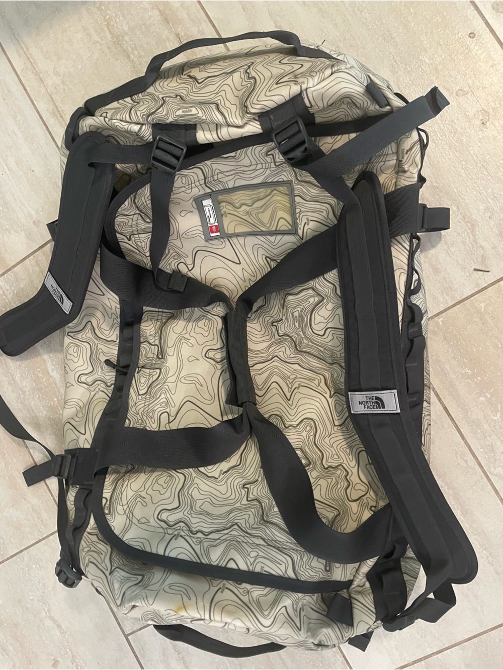 The North Face Men’s Tan Topographic Duffel with Black Straps